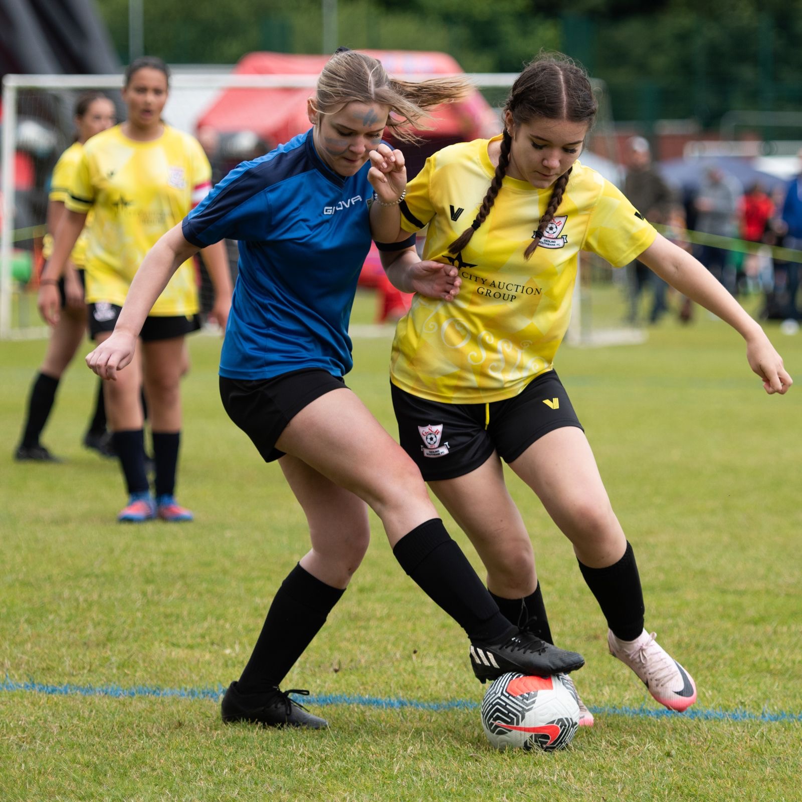 GSD football match action shot of two players trying to get the ball