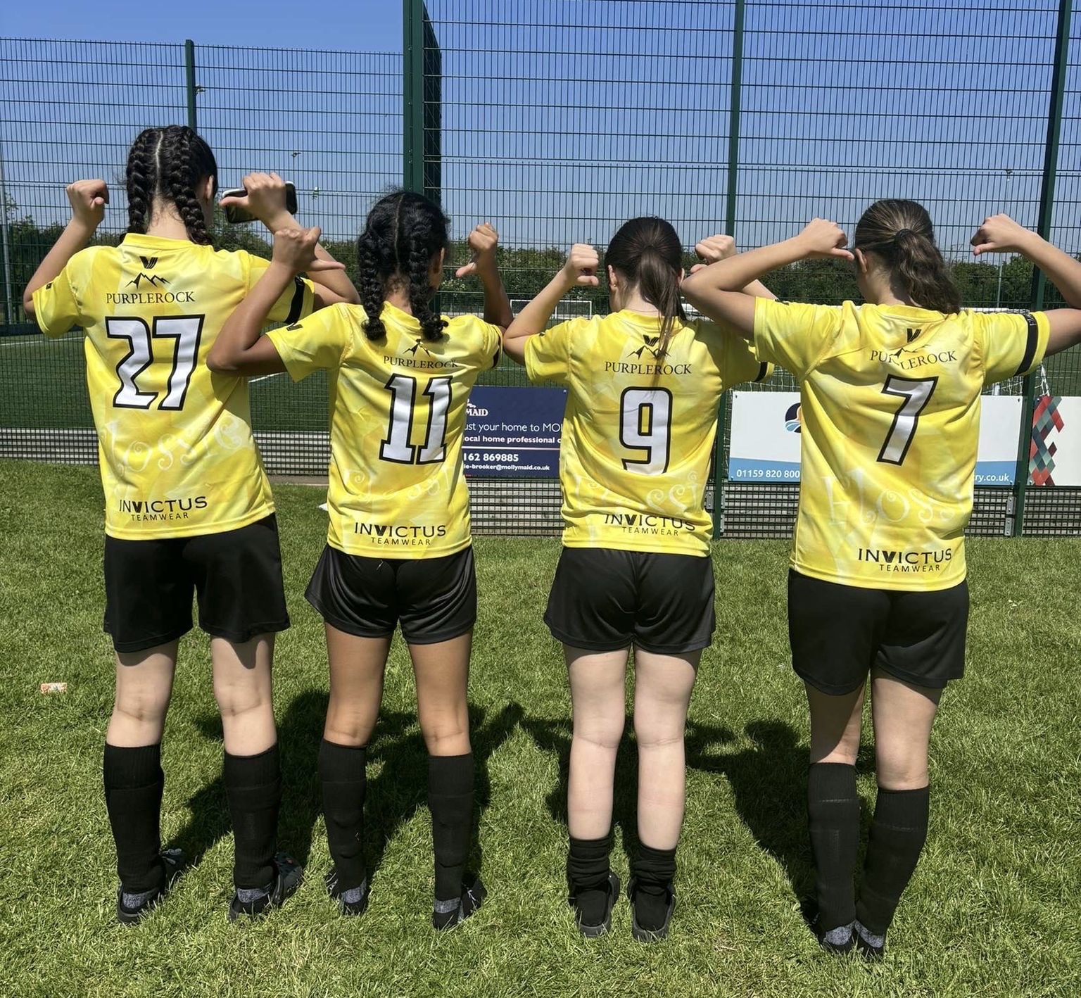 GSD football players numbers 27, 11, 9 and 7 after the match, facing the goals